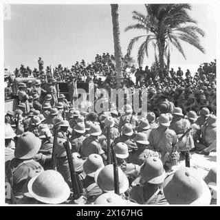 FIELD MARSHAL SMUTS VISITS THE SOUTH AFRICAN TROOPS IN THE WESTERN DESERT - The troops listening to the speech delivered by the Field Marshal after he had inspected them British Army Stock Photo