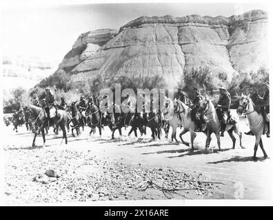 British Army troops are shown crossing the Irrawaddy River at Katha by ...