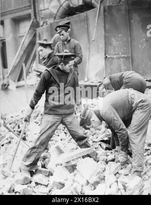 SAILORS HELP TO CLEAR UP AFTER PLYMOUTH BLITZ OF 21 MARCH 1941. MARCH ...