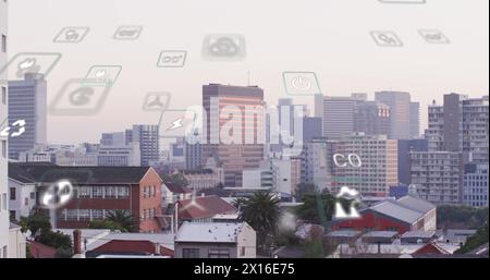 Image of eco icons and data processing over cityscape Stock Photo