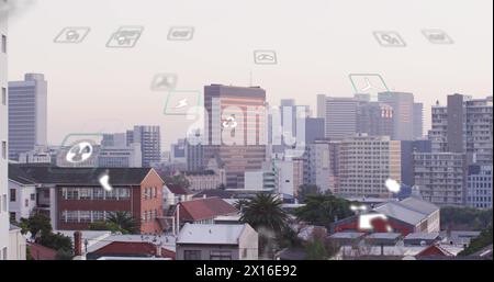 Image of eco icons and data processing over cityscape Stock Photo