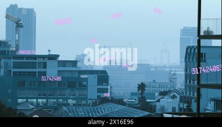 Image of numbers and data processing over cityscape Stock Photo
