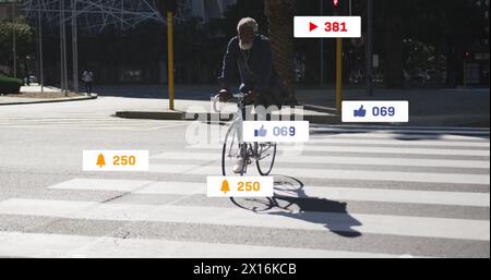 Image of media icons over senior african american man cycling Stock Photo