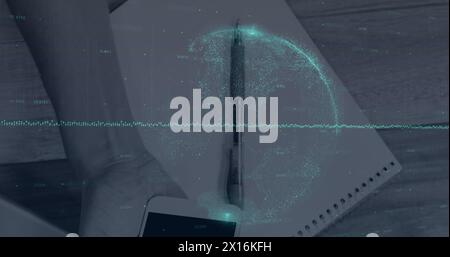 Image of financial data processing and globe over hand holding smartphone Stock Photo