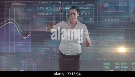 Image of caucasian businesswoman using touchscreen with diverse data Stock Photo