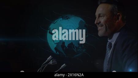Image of globe spinning over caucasian businessman giving speech Stock Photo