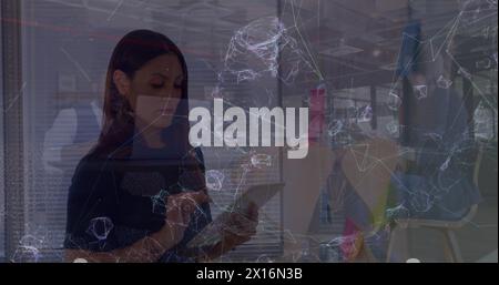 Image of multiracial woman using tablet, colleagues discussing in meeting over abstract pattern Stock Photo