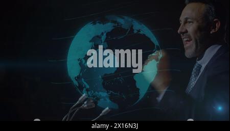 Image of globe spinning over caucasian businessman giving speech Stock Photo