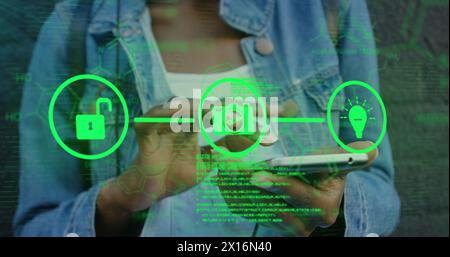 Image of tech icons and data over hands of biracial woman using smartphone Stock Photo