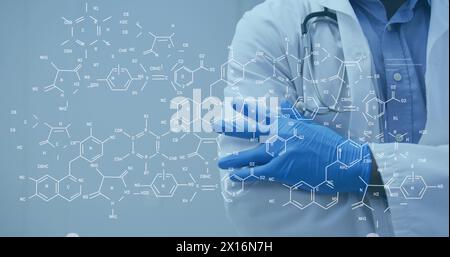 Image of chemical formula over african american male doctor Stock Photo ...