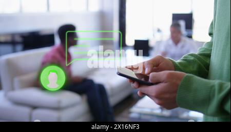 Image of media icon over hands using smartphone Stock Photo