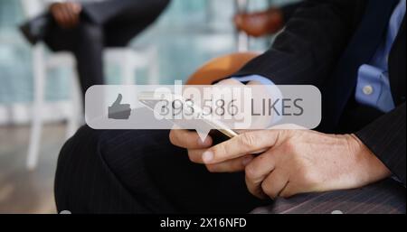 Image of media icon over hands using smartphone Stock Photo