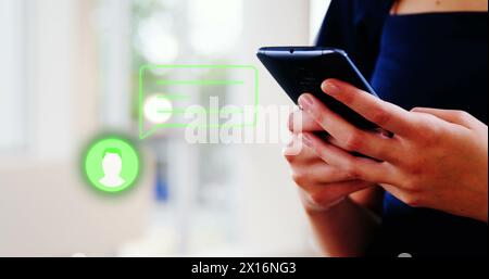 Image of media icon over hands using smartphone Stock Photo