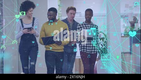 Image of network of connections over diverse coworkers talking in office Stock Photo