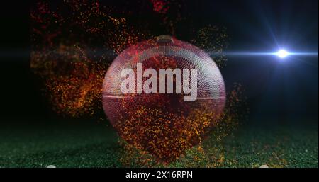 Image of moving lens flare and abstract pattern over rugby ball on green ground Stock Photo