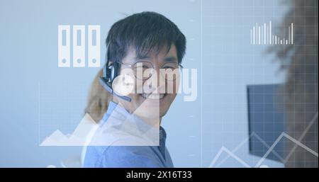 Image of financial data processing with icons over diverse business people Stock Photo