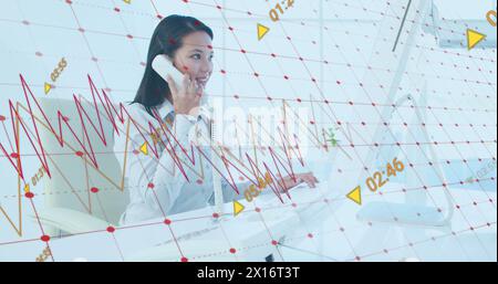 Image of financial data processing over asian businesswoman Stock Photo