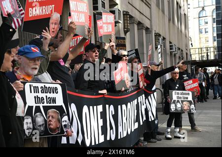 New York, United States. 14th Apr, 2024. Anti-Trump supporters march outside Manhattan criminal court on Monday, April 15, 2024 in New York. Jury selection began today in the criminal hush money trial of former President Donald Trump who is accused of falsifying business records to hide his affair with adult film actress Stormy Daniels. Photo by Louis Lanzano/UPI Credit: UPI/Alamy Live News Stock Photo