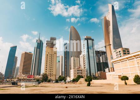Skyscrapers in the business district of Kuwait City, notably Al Hamra Tower (tallest) and NBK Tower (oval shaped) Stock Photo