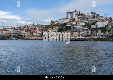 View of the Porto Riviera, stretching along thee Douro River between the cities of Porto and Vila Nova de Gaia, April 15, 2024 in Portugal. Stock Photo
