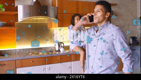 Image of connected icons over diverse woman drinking coffee and man talking on cellphone Stock Photo