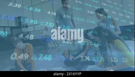 Image of financial data processing over diverse businesspeople in office Stock Photo