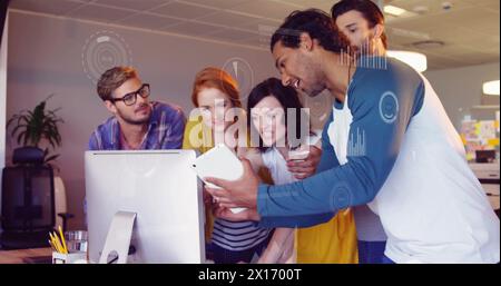 Image of data processing and diagrams over diverse business people discussing work Stock Photo