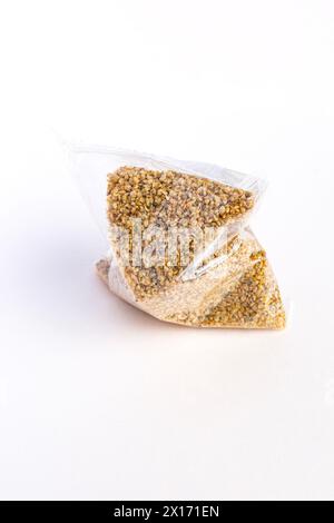 Dry food Daphnia for aquarium fish feed bag, package on White background Stock Photo