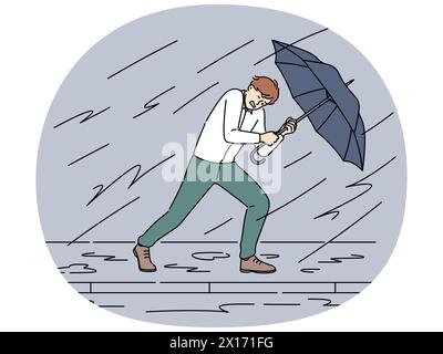 Decisive businessman with umbrella walk against storm and rain ...