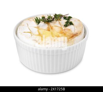 Tasty baked camembert and thyme in bowl isolated on white Stock Photo