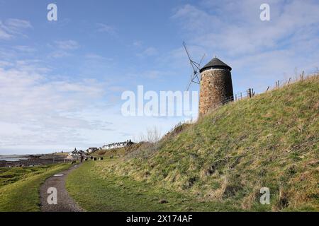St Monans windmill which was used to raise seawater into evaporating pans to make salt in the 18th century, St Monans, East Coast of Scotland, UK Stock Photo