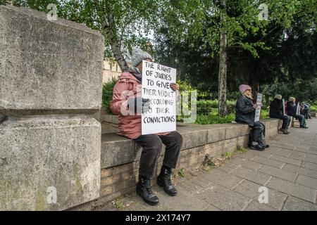 London, Britain, UK. 15th Apr, 2024. Wood Green Crown Court, London, UK, 15 April 2024. Defend Our Juries campaigners at London's Wood Green Crown Court hold quotes from the legal code that point at the 'right to be tried by a jury of one's peers'', 'vital protection against the abuse of power that dates back to the Magna Carta.'' They are supporting one of the first concerned citizens that held such sign out of a court of justice, on 18th of April 2024, Trudi Warner. She is on trial this week. Campaigners declare: 'we are sharing publicly available informations with th Stock Photo