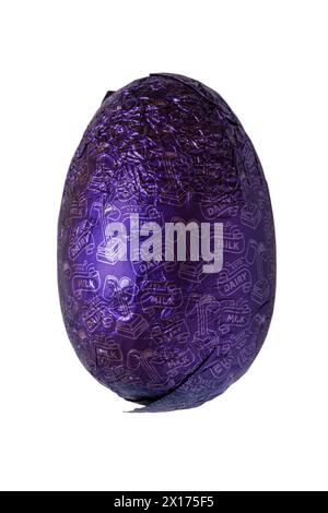 Dairy Milk Easter Egg isolated on white background - Cadbury Creme Egg Easter Egg, hollow milk chocolate egg Stock Photo