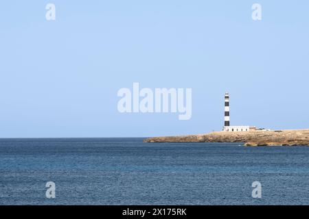Lighthouse of Cap d'Artrutx near the town of Cala en Bosch in the southwest of the Spanish island of Minorca. Stock Photo