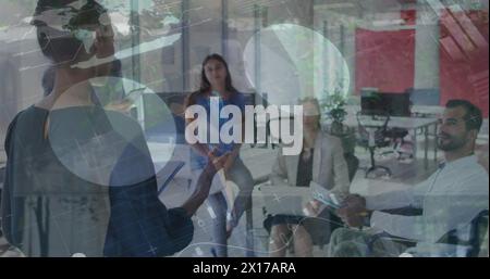 Image of data processing over group of diverse people Stock Photo