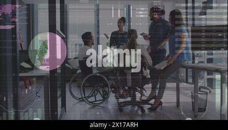 Image of data processing over diverse and disabled business people at meeting Stock Photo