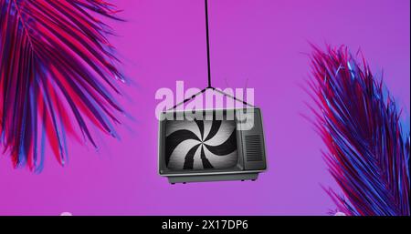 Image of black and white stripes spinning over retro tv on purple background Stock Photo