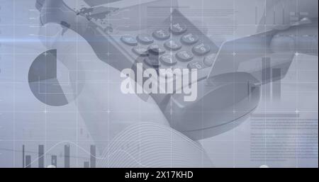 Statistical data processing against close up of person's hand using a card machine Stock Photo