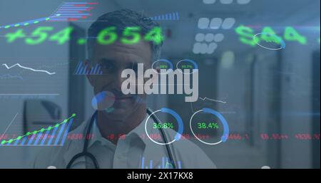 Image of statistical data processing over caucasian male doctor writing on clipboard at hospital Stock Photo
