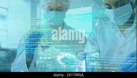 Grid lines and data processing over  two caucasian female scientists in a laboratory Stock Photo