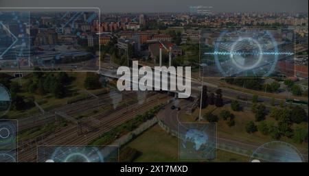 Image of round scanners and data processing against aerial view of cityscape Stock Photo