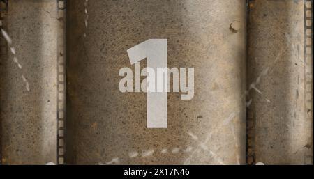 Vertical view of vintage film countdown image with sizzles 4k Stock Photo