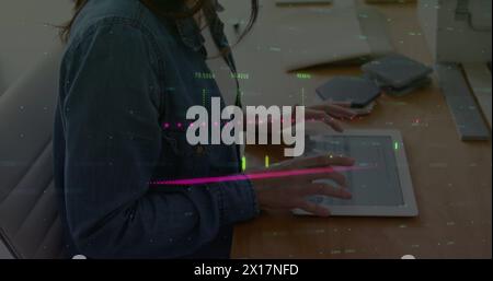 Image of financial data processing against caucasian woman using digital tablet at office Stock Photo