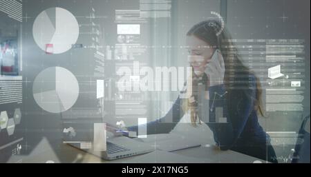 Image of scope scanning and data processing over businesswoman with hands Stock Photo
