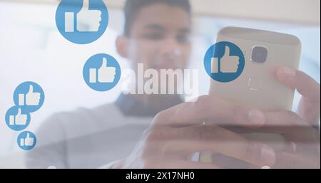 Image of digital clouds with percent going up over man using smartphone Stock Photo