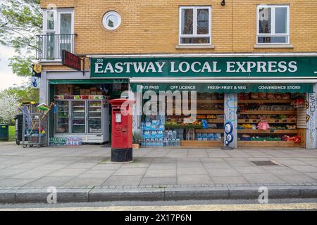 Local convenience store with red postbox in North London. Stock Photo