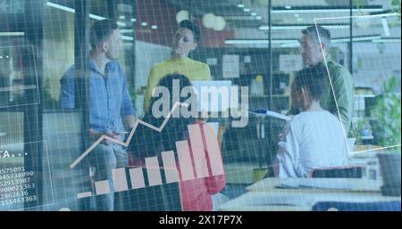 Image of graphs and computer language over diverse woman with laptop discussing with colleagues Stock Photo