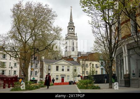 St James’s Church, Clerkenwell, with its historic Georgian architecture, stands amidst London's vibrant cityscape Stock Photo