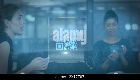 Image of qr code over diverse business people having meeting at office Stock Photo