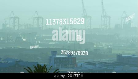 Image of changing numbers and computer language over fog covered modern city Stock Photo
